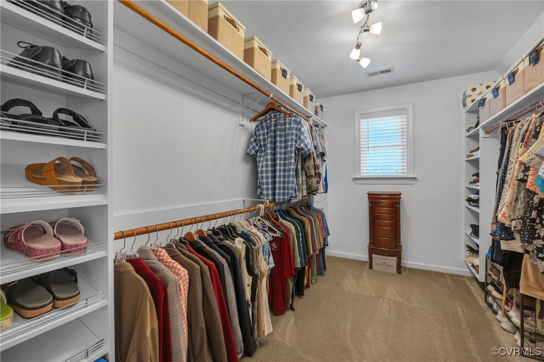 14022 Redhills Road Beaverdam, VA 23015 - Photo 28 of 50 Primary bedroom walk in closet with carpet and clo