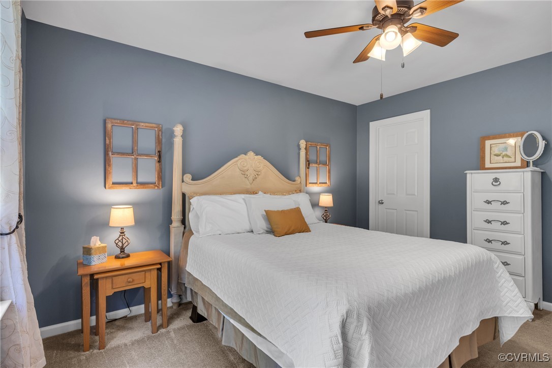 14022 Redhills Road Beaverdam, VA 23015 - Photo 30 of 50 Carpeted bedroom featuring a walk-in closet and a