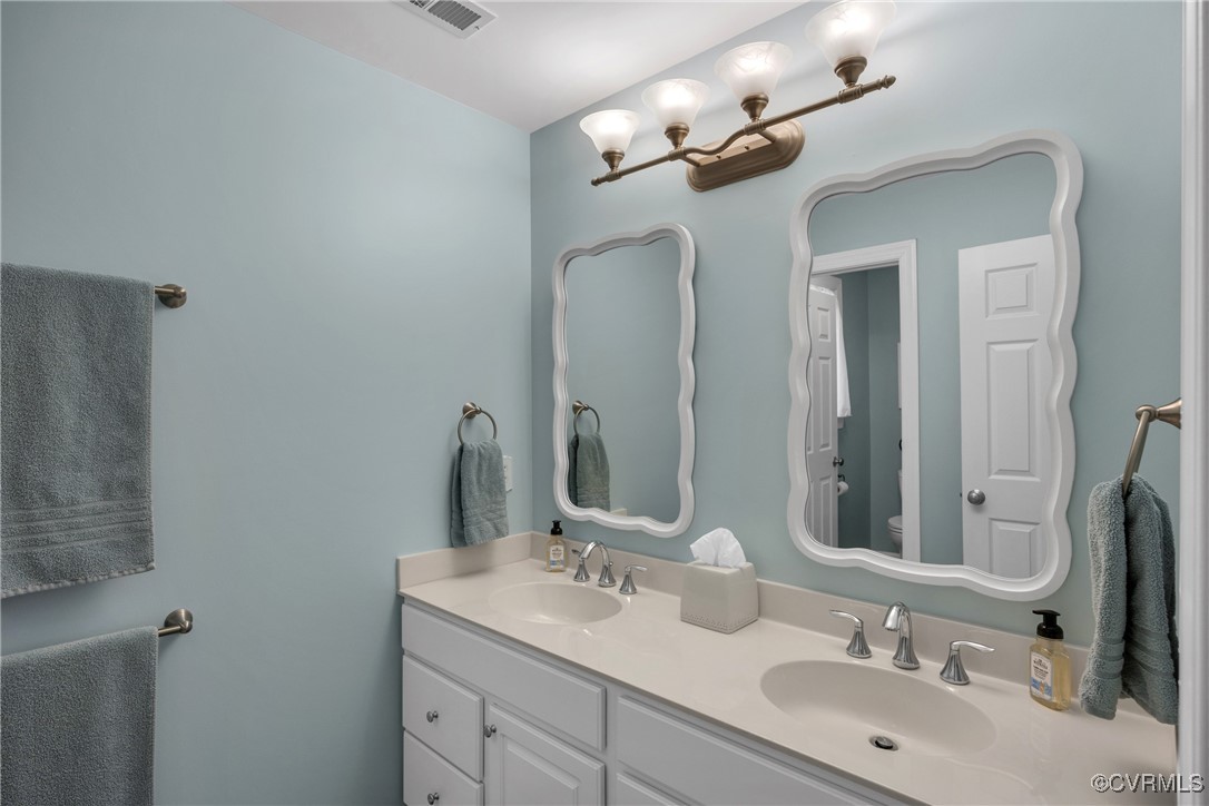 14022 Redhills Road Beaverdam, VA 23015 - Photo 35 of 50 Full bath with double vanity. tub/shower and toile