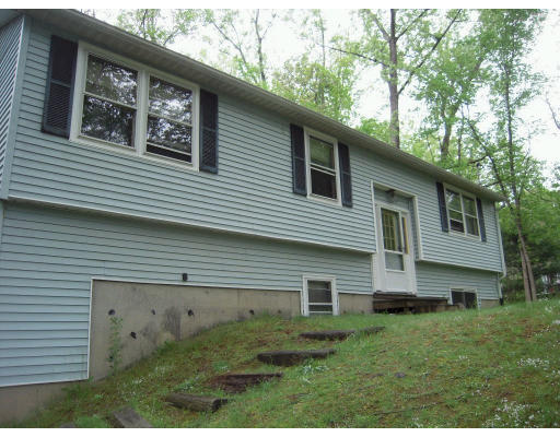 66 Pelham Road Amherst, MA 01002 - Photo 1 of 1 a view of a house with a yard