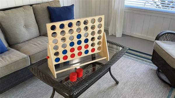 a living room with furniture and a couch