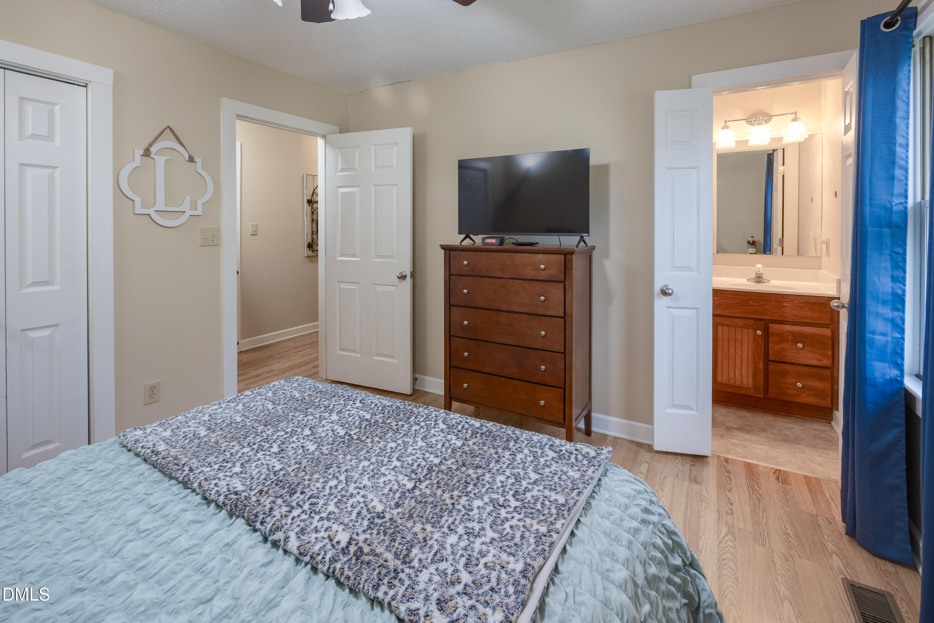 1854 Pope Road Dunn, NC 28334 - Photo 18 of 27 a bedroom with a bed and a television