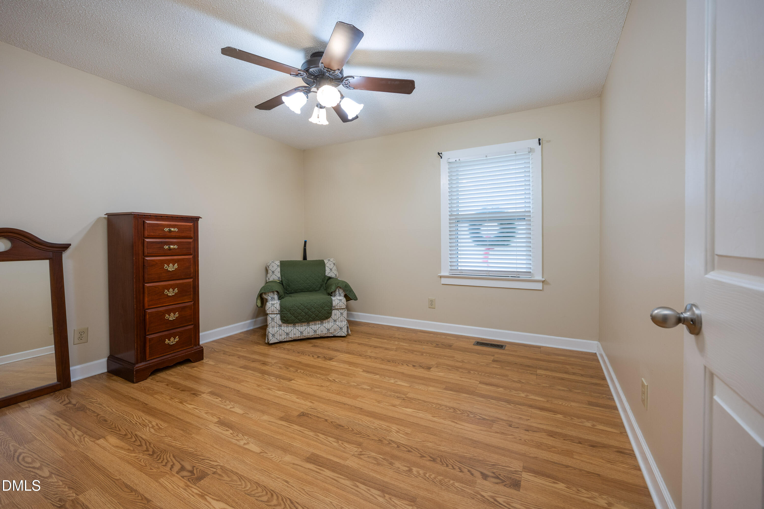 1854 Pope Road Dunn, NC 28334 - Photo 20 of 27 a view of an empty room with a window