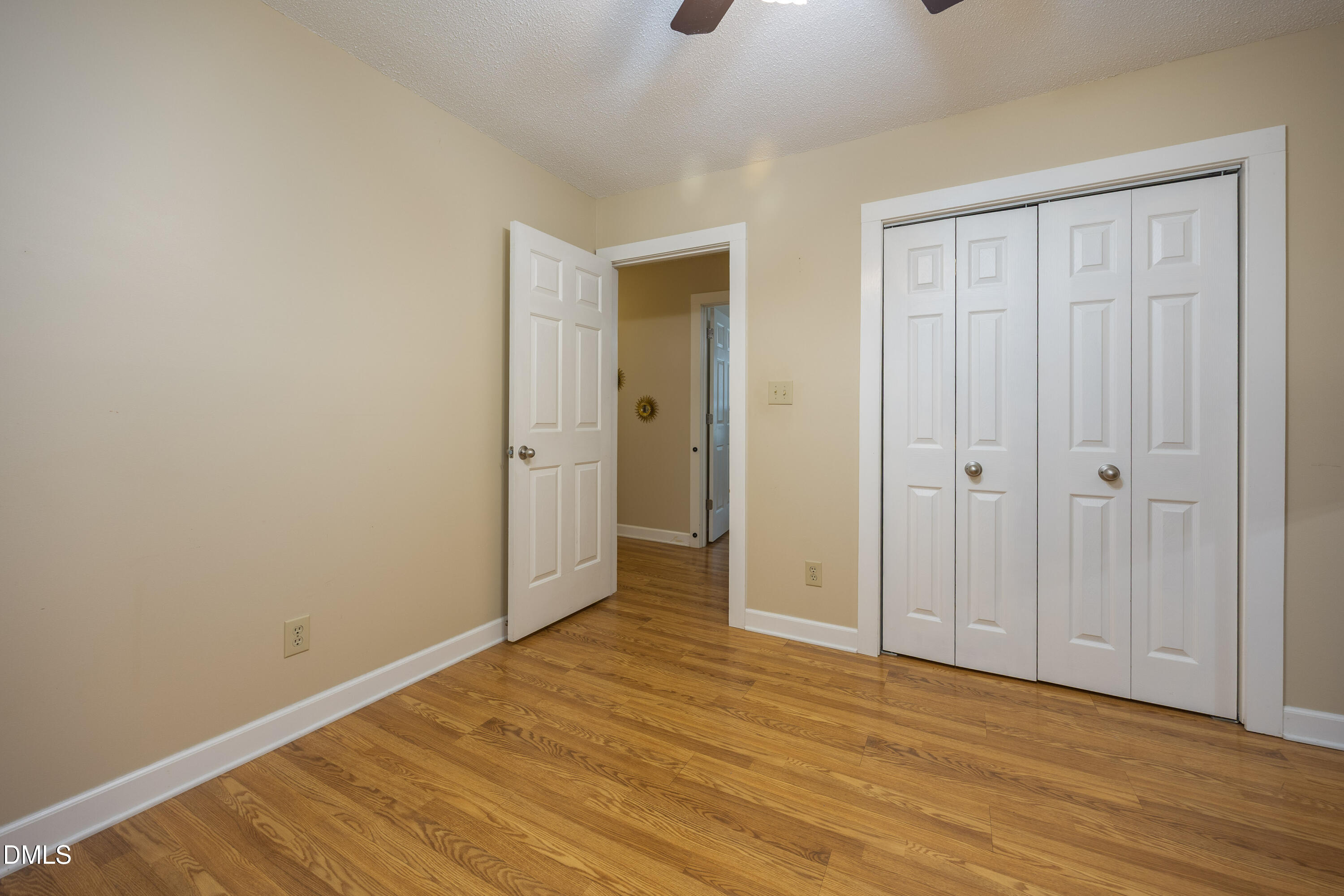 1854 Pope Road Dunn, NC 28334 - Photo 22 of 27 a view of an empty room with wooden floor