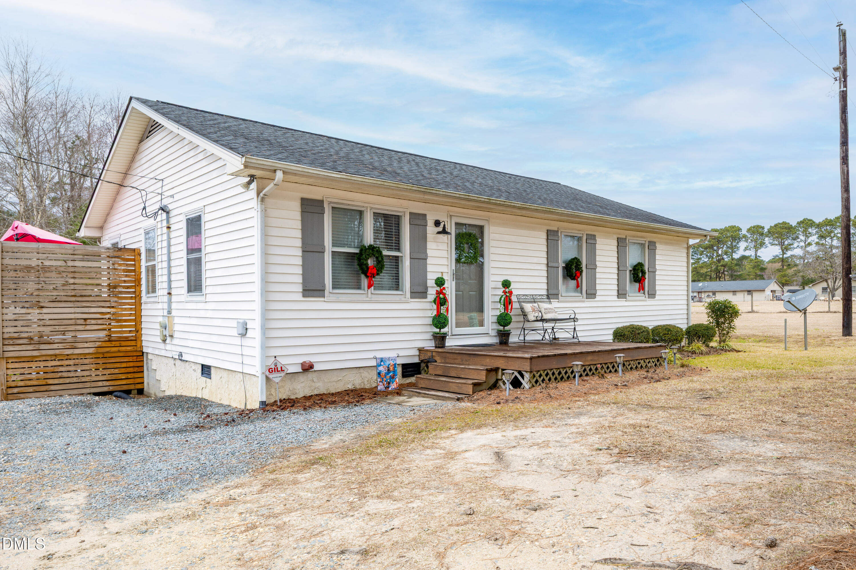 1854 Pope Road Dunn, NC 28334 - Photo 3 of 27 a view of a house with backyard and sitting area