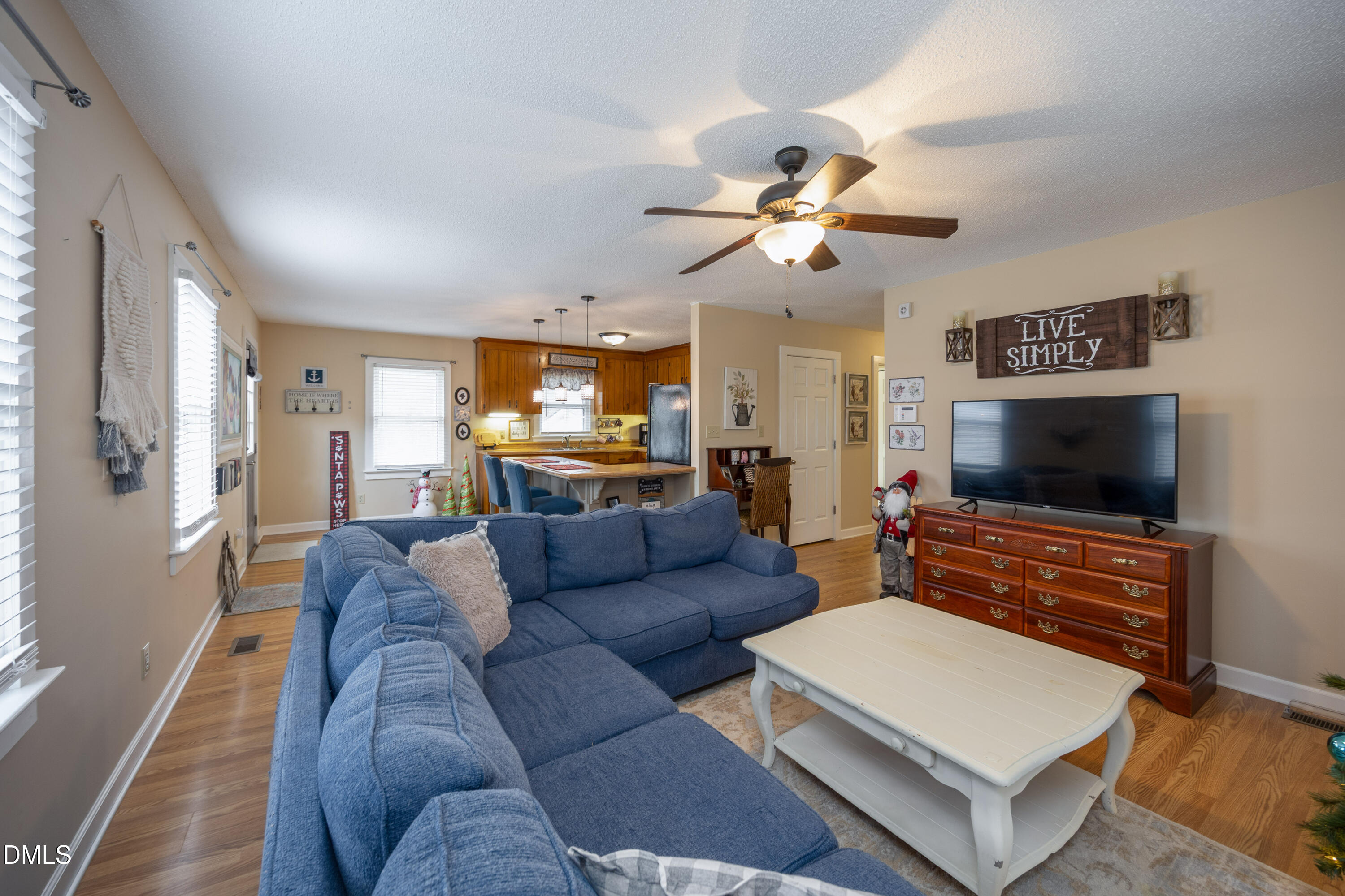 1854 Pope Road Dunn, NC 28334 - Photo 6 of 27 a living room with furniture and a flat screen tv