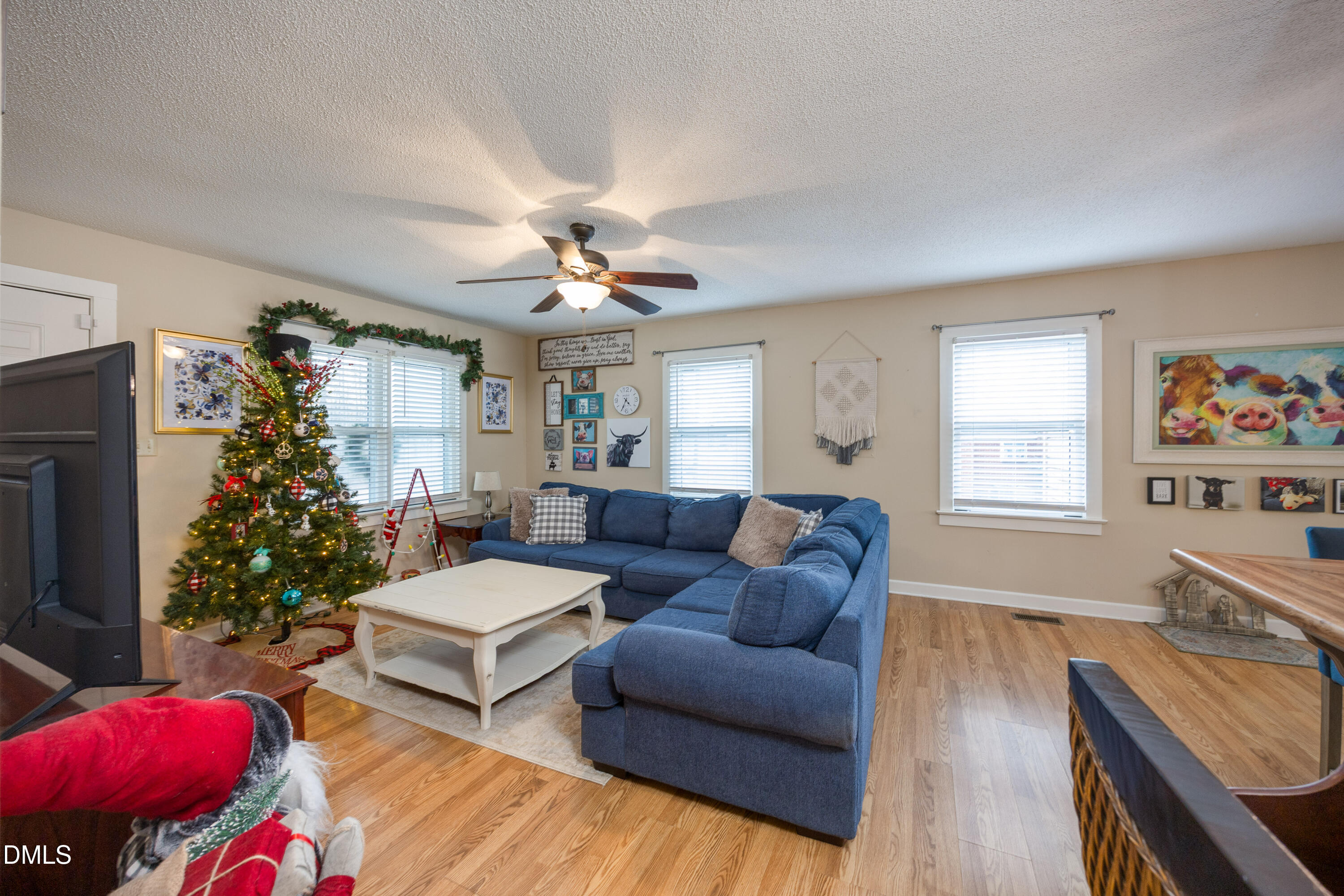 1854 Pope Road Dunn, NC 28334 - Photo 7 of 27 a living room with furniture and a large window