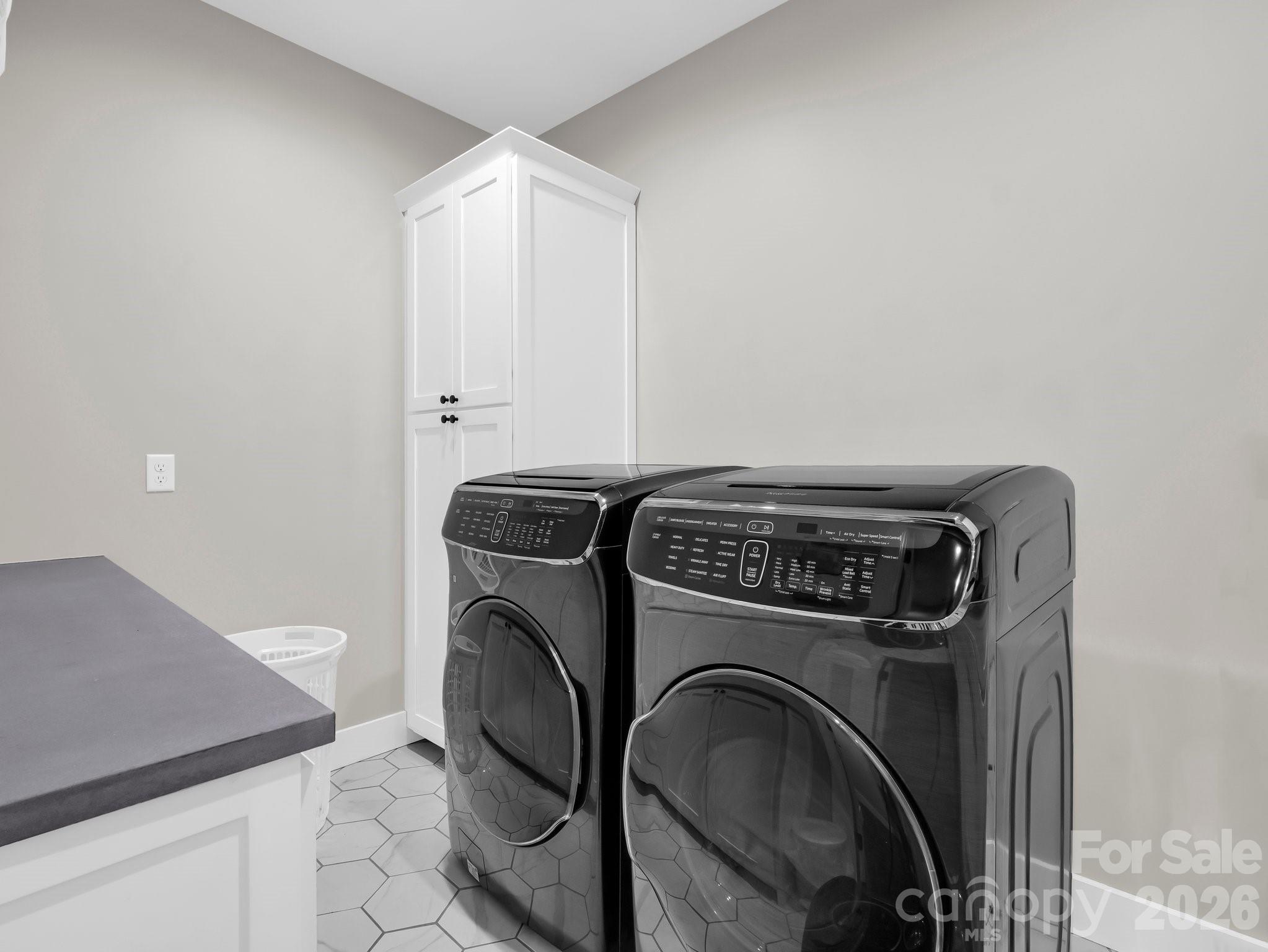 5717 Turnpike Road Horse Shoe, NC 28742 - Photo 21 of 36 a utility room with dryer and washer