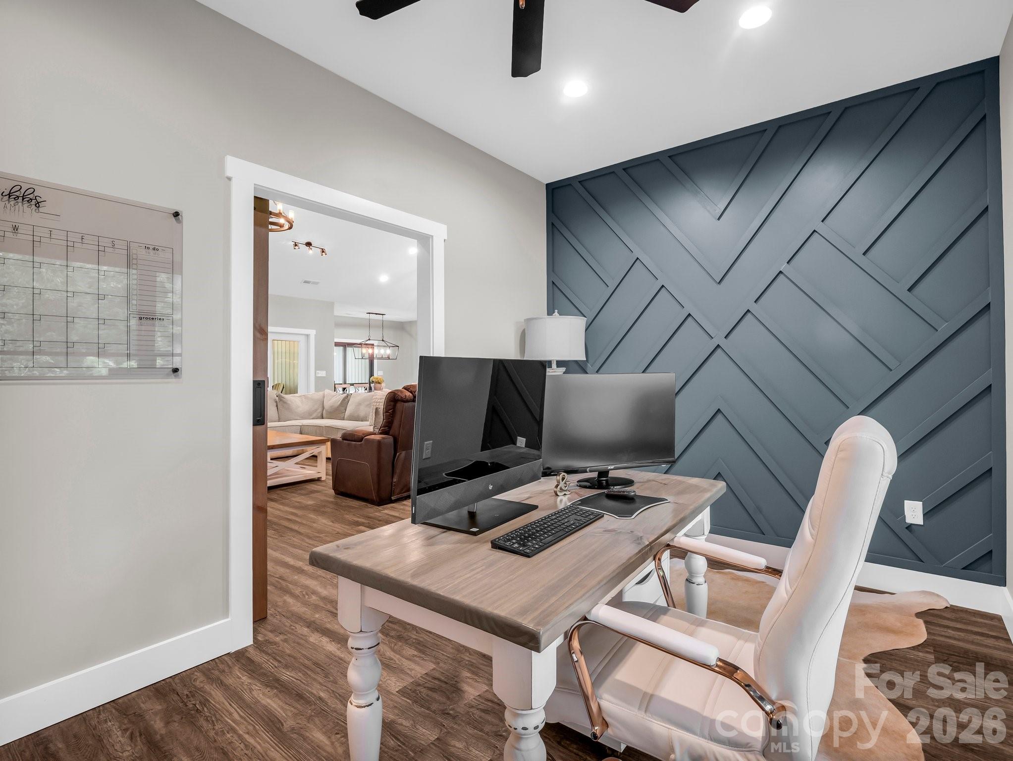 5717 Turnpike Road Horse Shoe, NC 28742 - Photo 23 of 36 a view of workspace with wooden floor windows