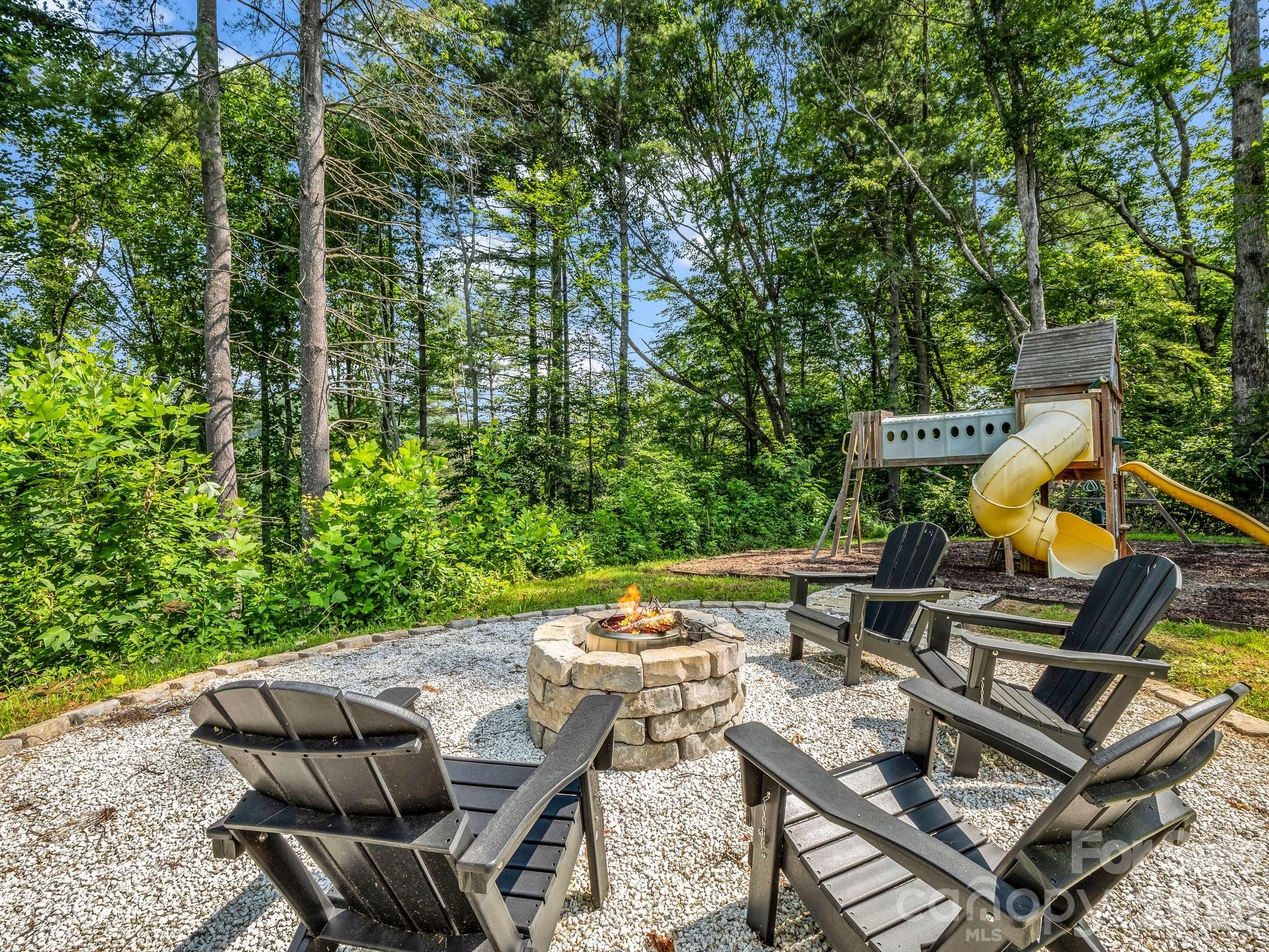 5717 Turnpike Road Horse Shoe, NC 28742 - Photo 30 of 36 a view of an outdoor sitting area with furniture
