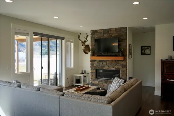 a view of a dining room with furniture window and outside view