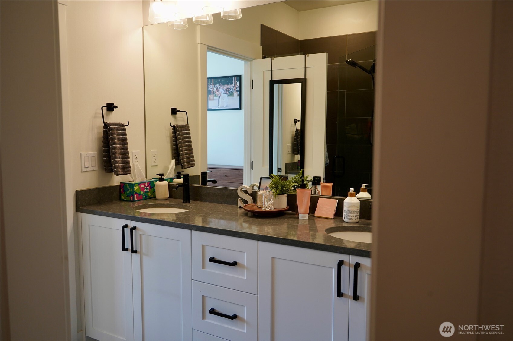 104 Freedom Hills Cashmere, WA 98815 - Photo 23 of 40 a bathroom with double sink and a mirror