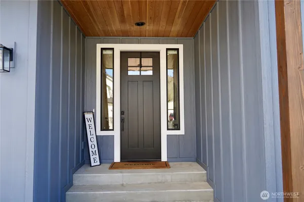 a view of a livingroom from a hallway