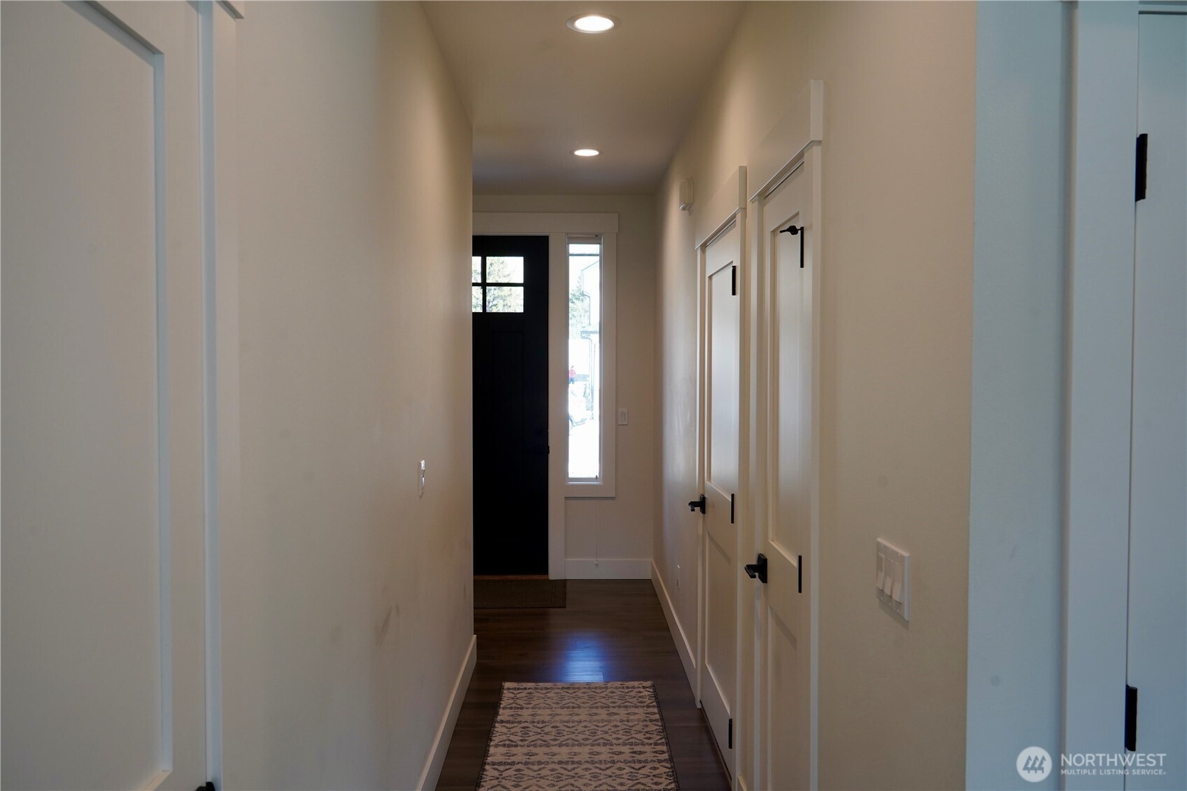 104 Freedom Hills Cashmere, WA 98815 - Photo 10 of 40 a view of a hallway with wooden floor and staircase