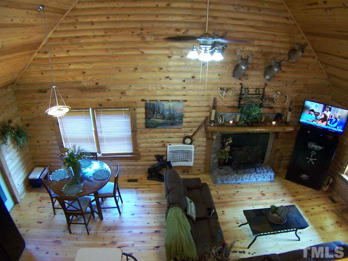 239 Rocky Ridge Road Leasburg, NC 27291 - Photo 9 of 23 a living room filled with furniture