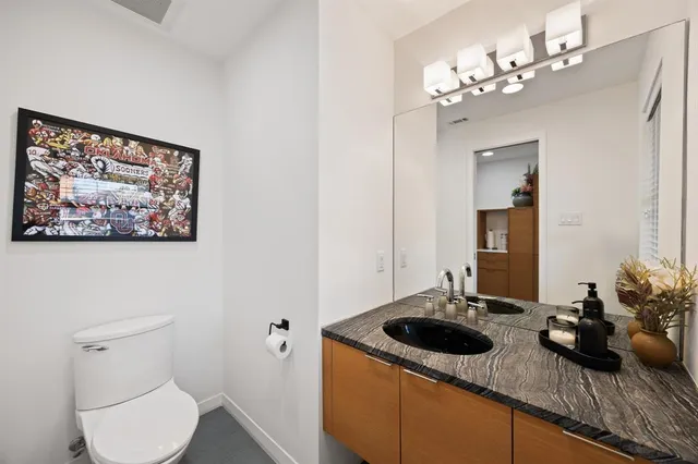 a bathroom with a shower and a sink