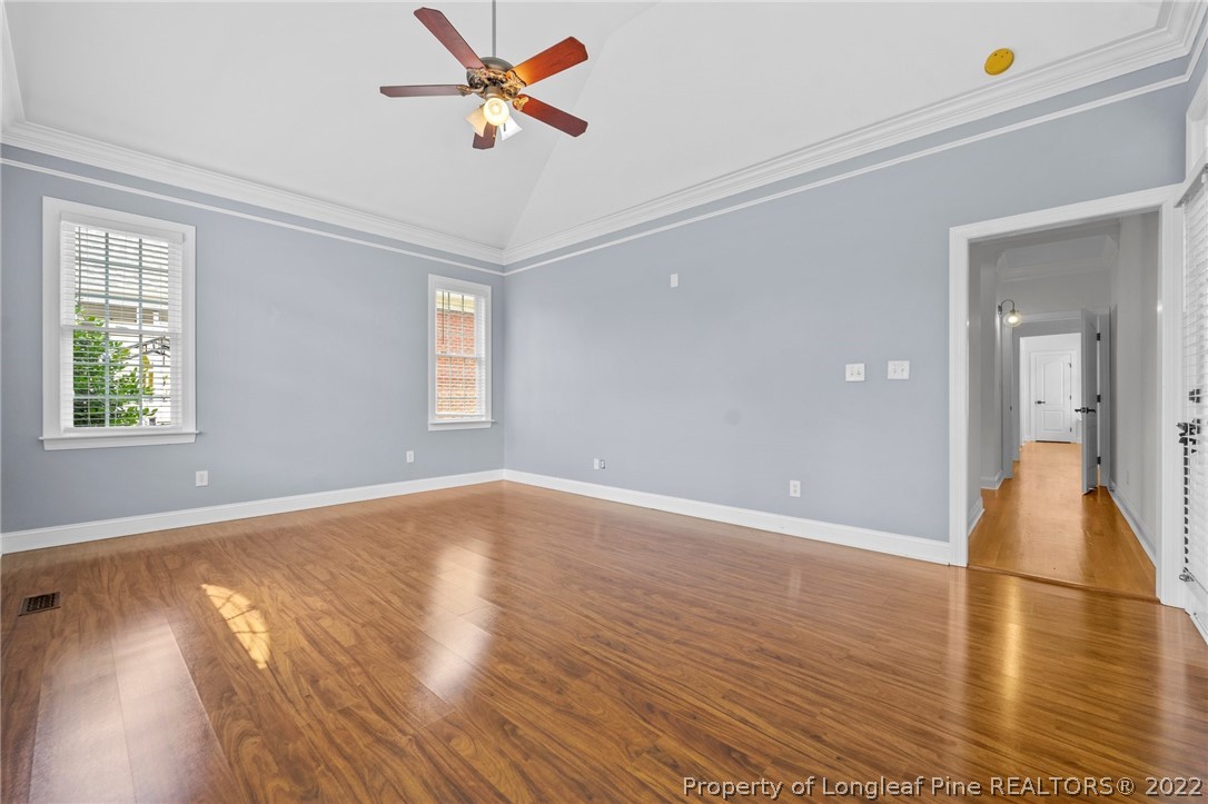 255 Falling Water Road Spring Lake, NC 28390 - Photo 27 of 39 an empty room with wooden floor and windows