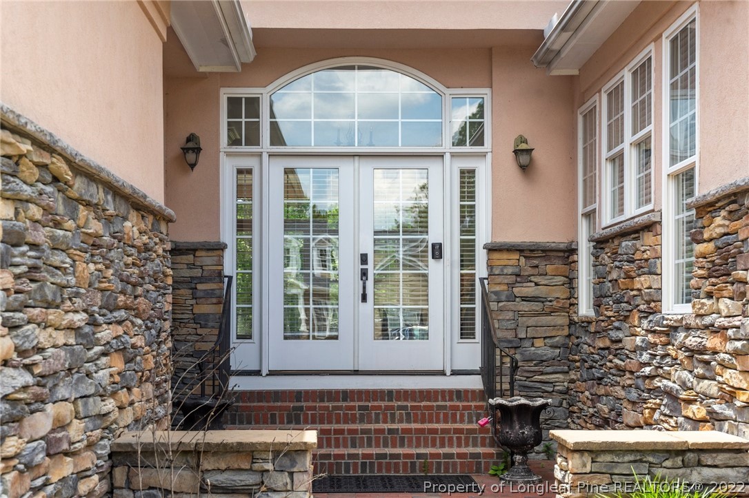 255 Falling Water Road Spring Lake, NC 28390 - Photo 6 of 39 front view of a brick house with a window