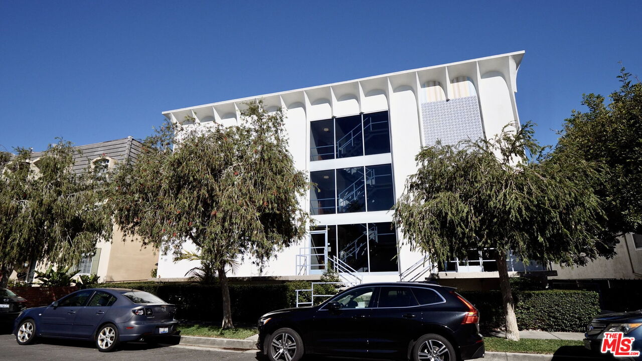 8710 Delgany Avenue, Unit 3 Playa del Rey, CA 90293 - Photo 1 of 21 a view of parking with cars parked