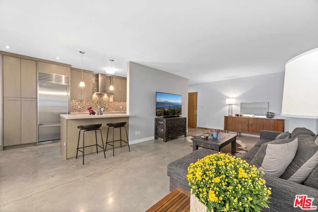 8710 Delgany Avenue, Unit 3 Playa del Rey, CA 90293 - Photo 5 of 21 a view of a dining room with furniture