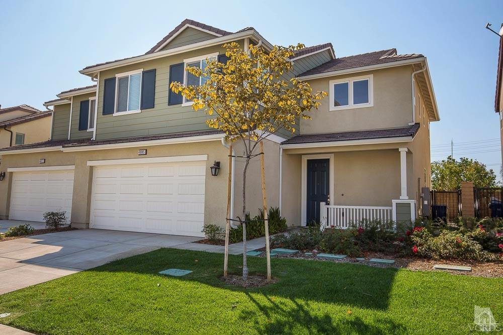 4885 Edenbridge Road Moorpark, CA 93021 - Photo 1 of 30 a front view of a house with a yard and garage