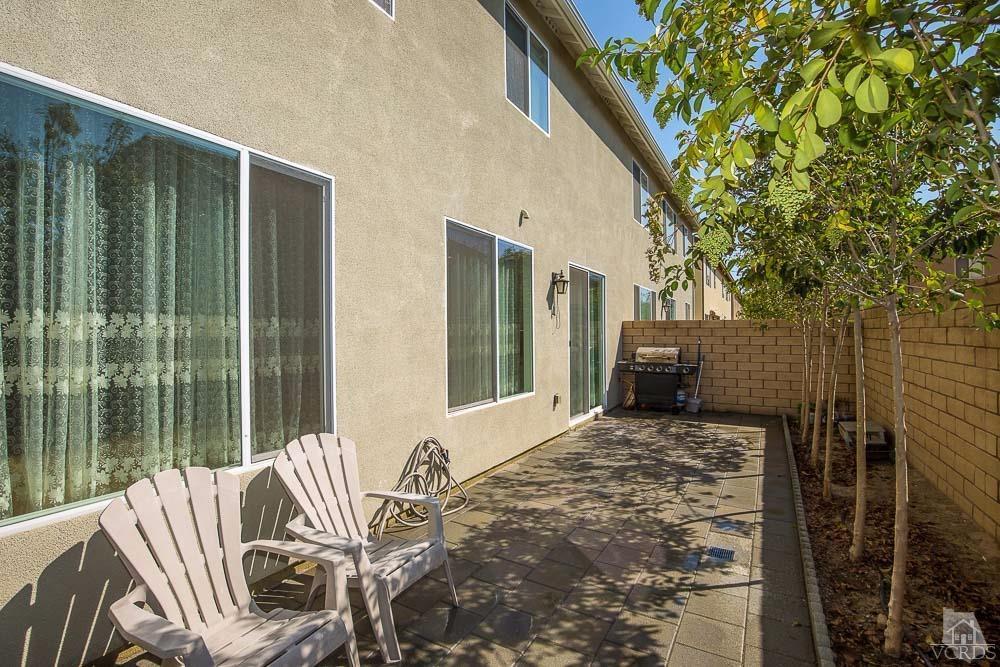 4885 Edenbridge Road Moorpark, CA 93021 - Photo 29 of 30 a view of balcony with two chairs and a patio