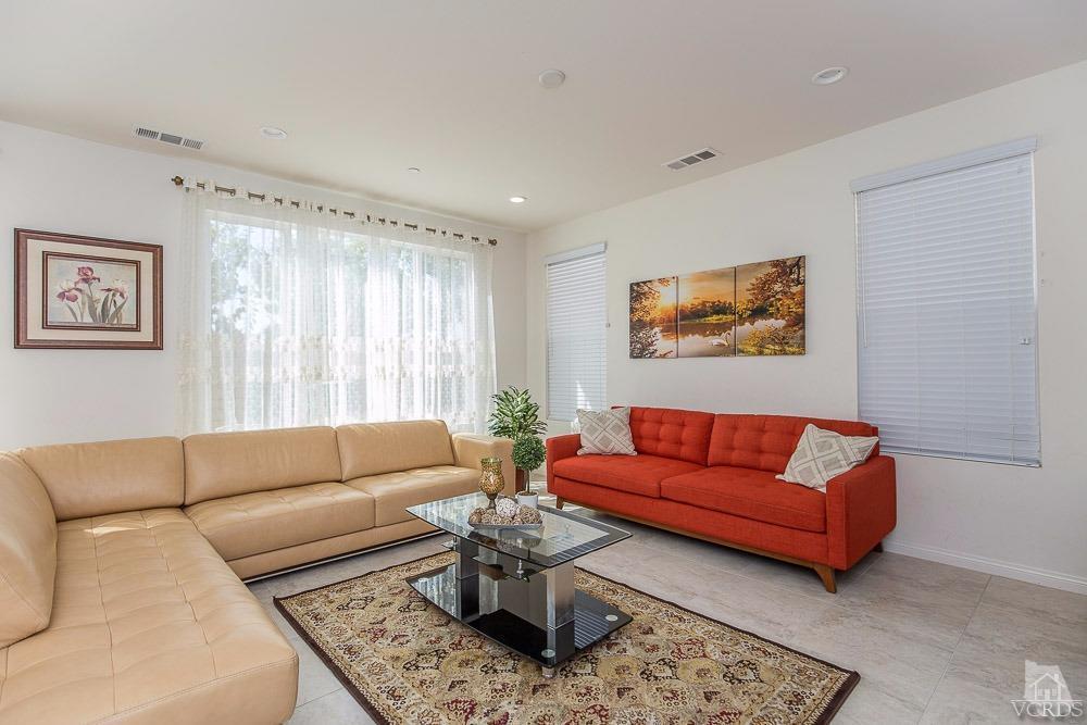 4885 Edenbridge Road Moorpark, CA 93021 - Photo 6 of 30 a living room with furniture and a couch
