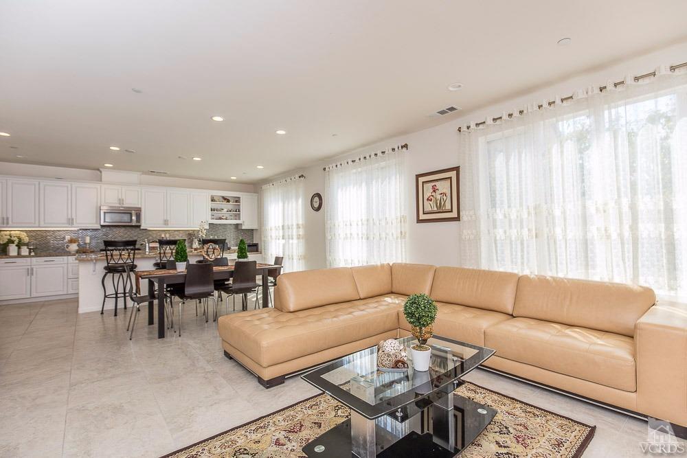 4885 Edenbridge Road Moorpark, CA 93021 - Photo 7 of 30 a living room with furniture kitchen and a table