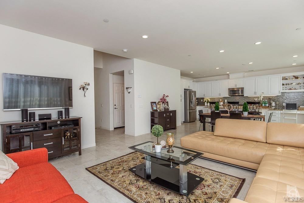 4885 Edenbridge Road Moorpark, CA 93021 - Photo 9 of 30 a living room with furniture kitchen view and a table