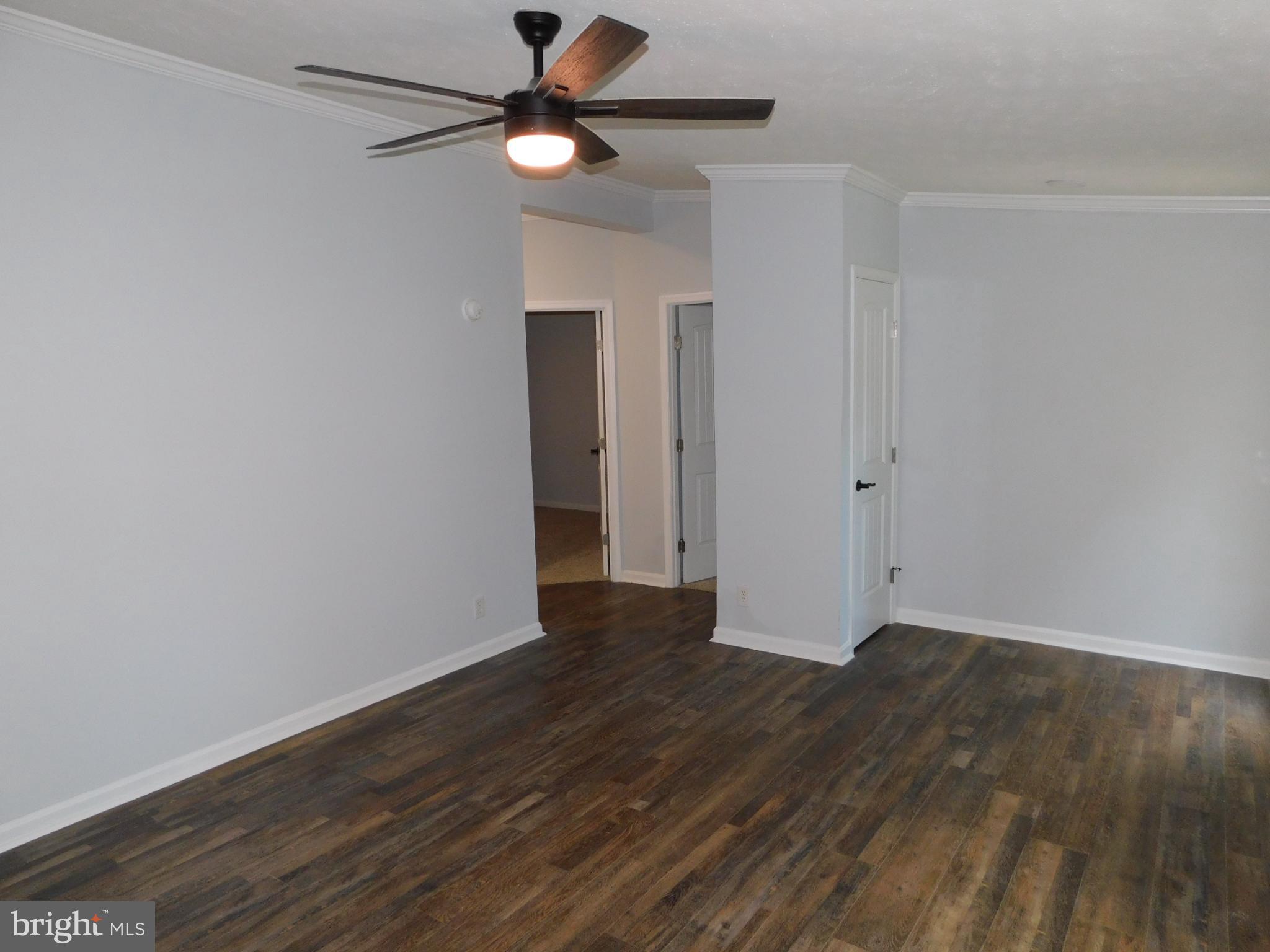 2608 Hunting Quarter Road Houston, DE 19954 - Photo 23 of 58 wooden floor in an empty room