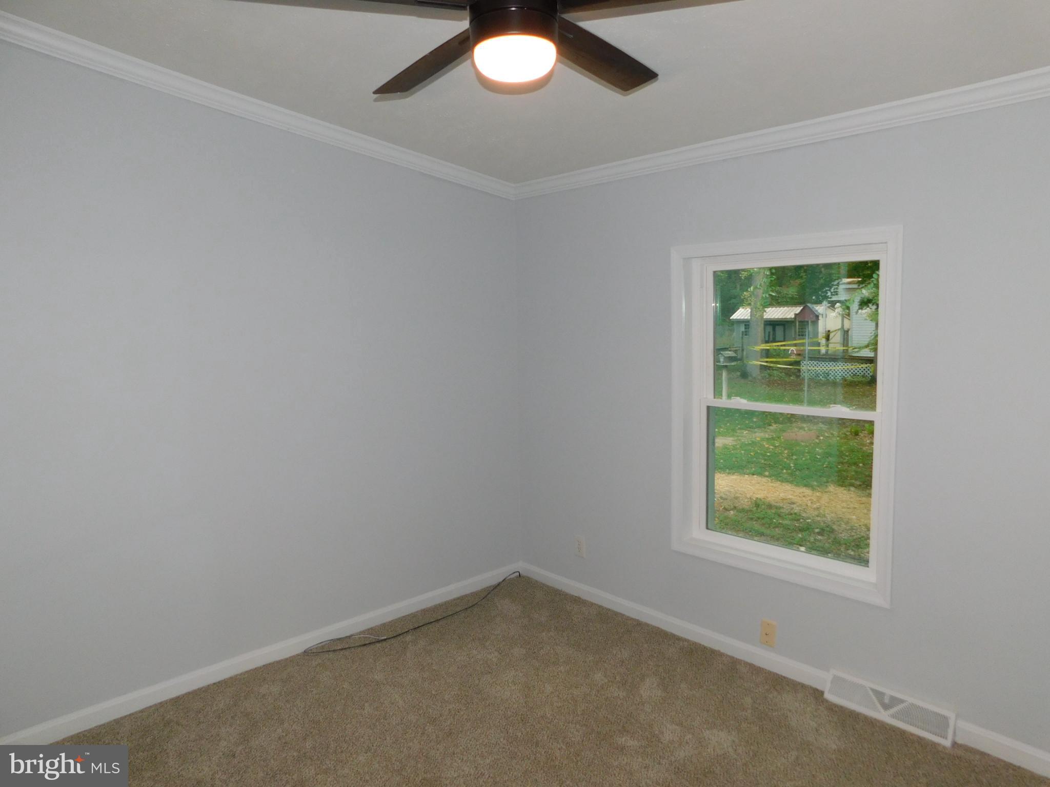 2608 Hunting Quarter Road Houston, DE 19954 - Photo 40 of 58 an empty room with a window