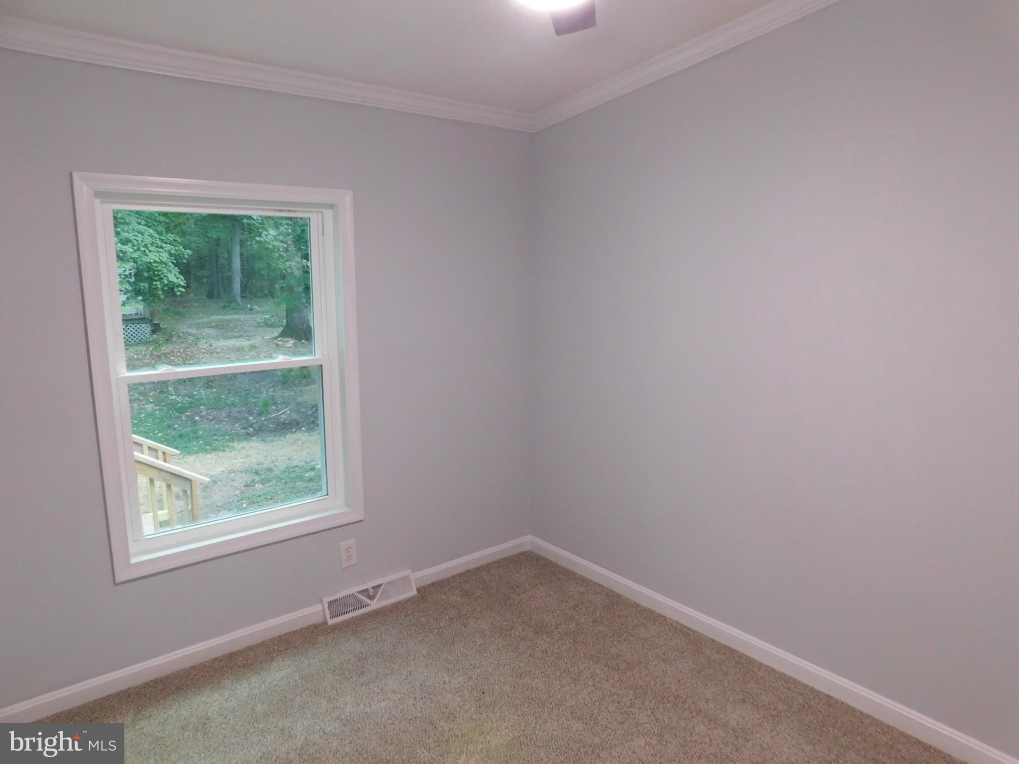 2608 Hunting Quarter Road Houston, DE 19954 - Photo 41 of 58 an empty room with a window