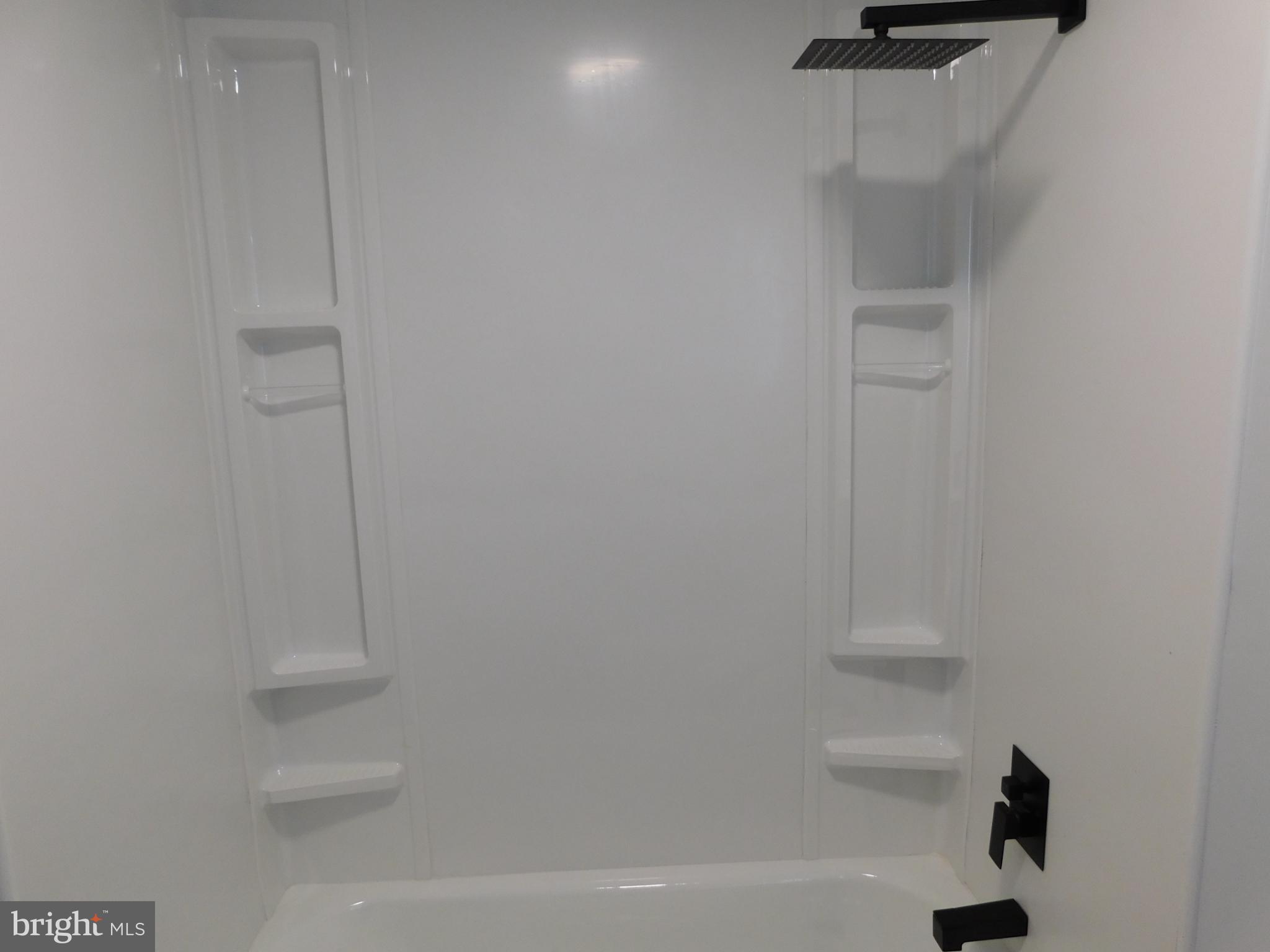 2608 Hunting Quarter Road Houston, DE 19954 - Photo 45 of 58 a bathroom with a shower