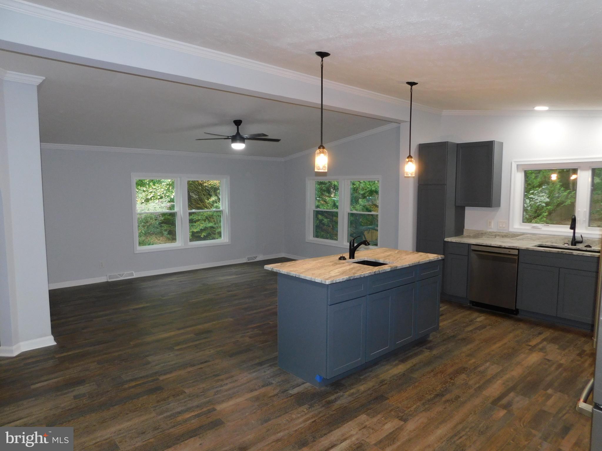 2608 Hunting Quarter Road Houston, DE 19954 - Photo 9 of 58 Kitchen into Family Room