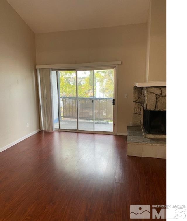 2555 Clear Acre Lane, Unit 933 Reno, NV 89512 - Photo 7 of 14 wooden floor in an empty room with a window