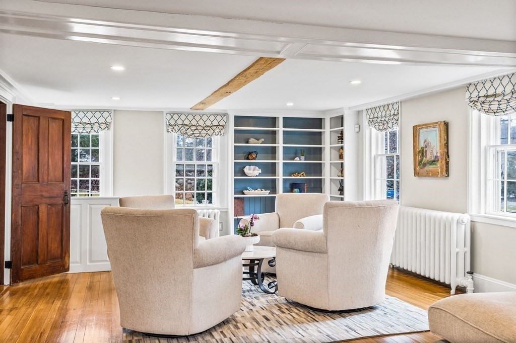 597 Main Street Hingham, MA 02043 - Photo 12 of 42 a living room with furniture and windows