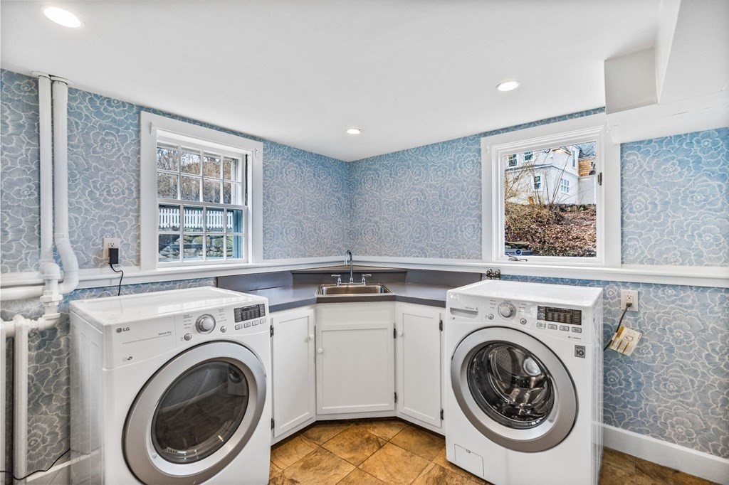 597 Main Street Hingham, MA 02043 - Photo 15 of 42 a view of a kitchen with washer and dryer