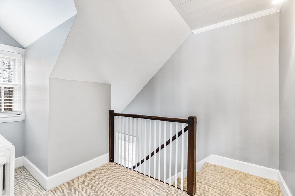 597 Main Street Hingham, MA 02043 - Photo 25 of 42 a view of a hallway with wooden floor and entryway