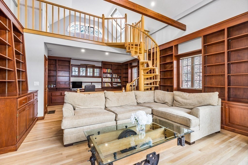 597 Main Street Hingham, MA 02043 - Photo 29 of 42 a living room with furniture a wooden floor and a large window