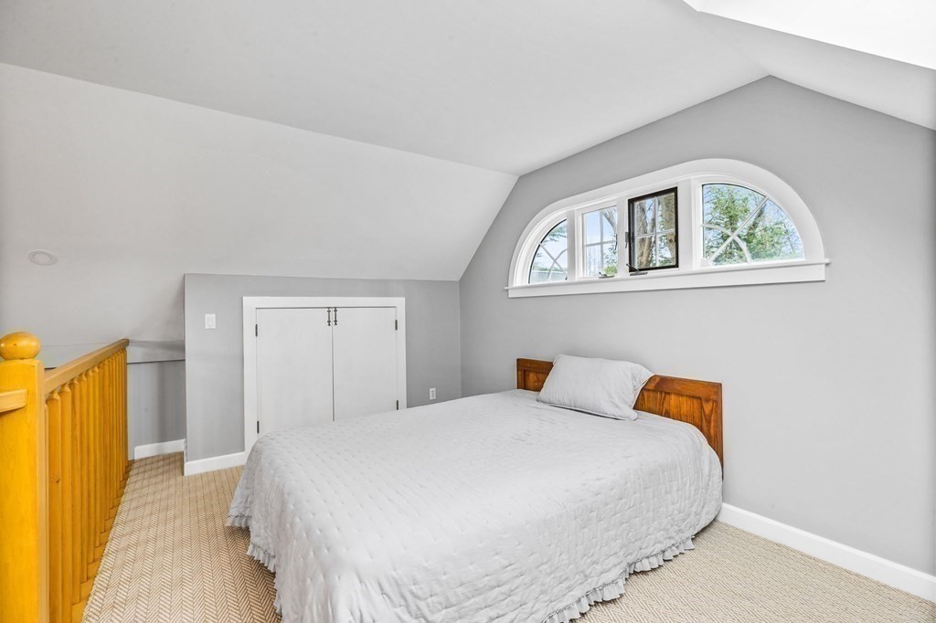 597 Main Street Hingham, MA 02043 - Photo 33 of 42 a bedroom with a bed and a window