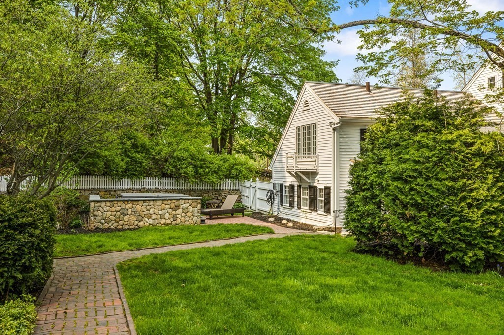 597 Main Street Hingham, MA 02043 - Photo 36 of 42 a view of a house with a yard
