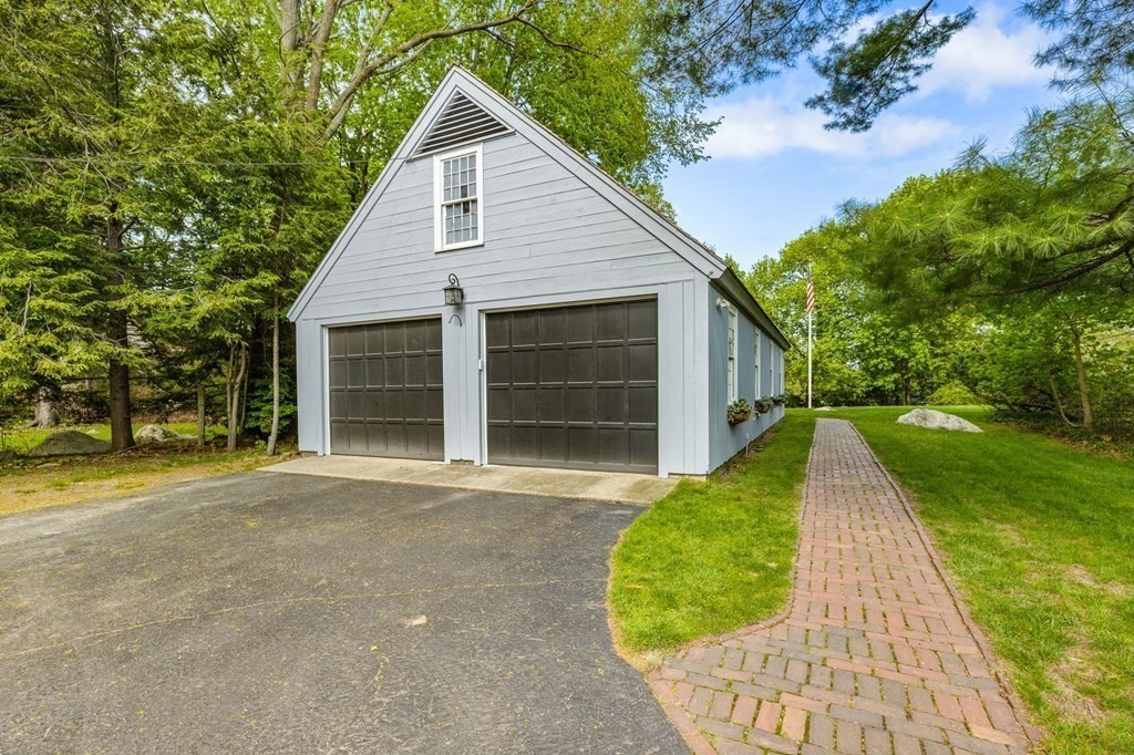 597 Main Street Hingham, MA 02043 - Photo 37 of 42 a view of a house with a yard