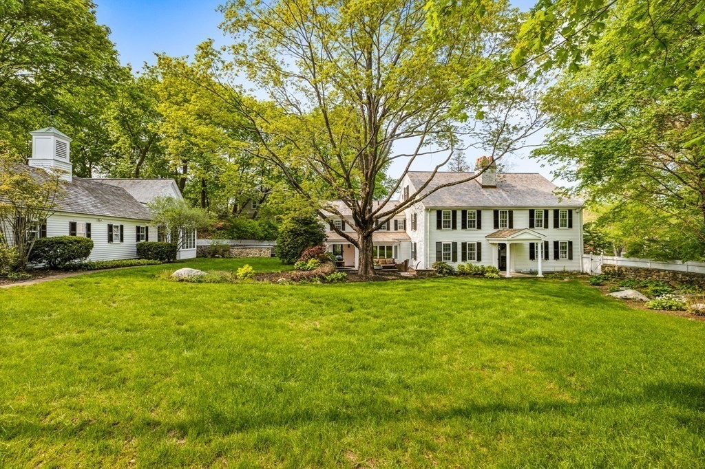 597 Main Street Hingham, MA 02043 - Photo 39 of 42 a front view of a house with a garden