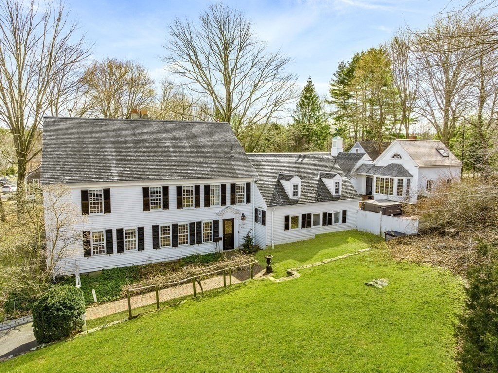 597 Main Street Hingham, MA 02043 - Photo 41 of 42 a view of a house with a large pool and sitting area