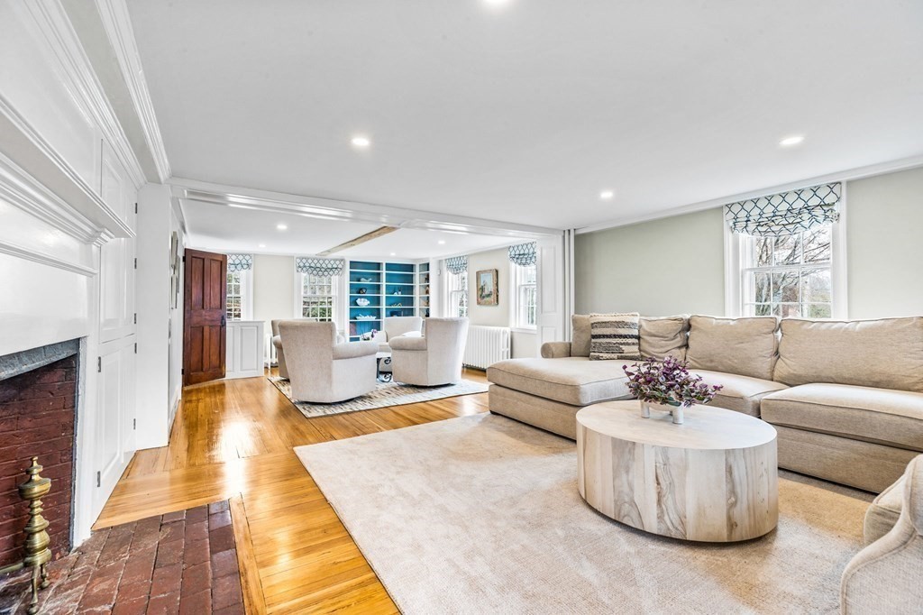 597 Main Street Hingham, MA 02043 - Photo 10 of 42 a living room with furniture and a large window