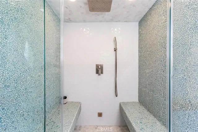 a kitchen with a sink appliances and cabinets