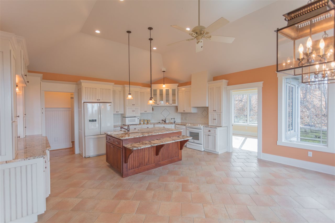 110 East Ridge Drive Lexington, VA 24450 - Photo 21 of 50 a large kitchen with a large window and stainless steel appliances