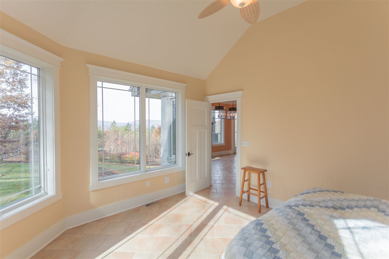 110 East Ridge Drive Lexington, VA 24450 - Photo 26 of 50 a bedroom with a bed and a large window with outer view