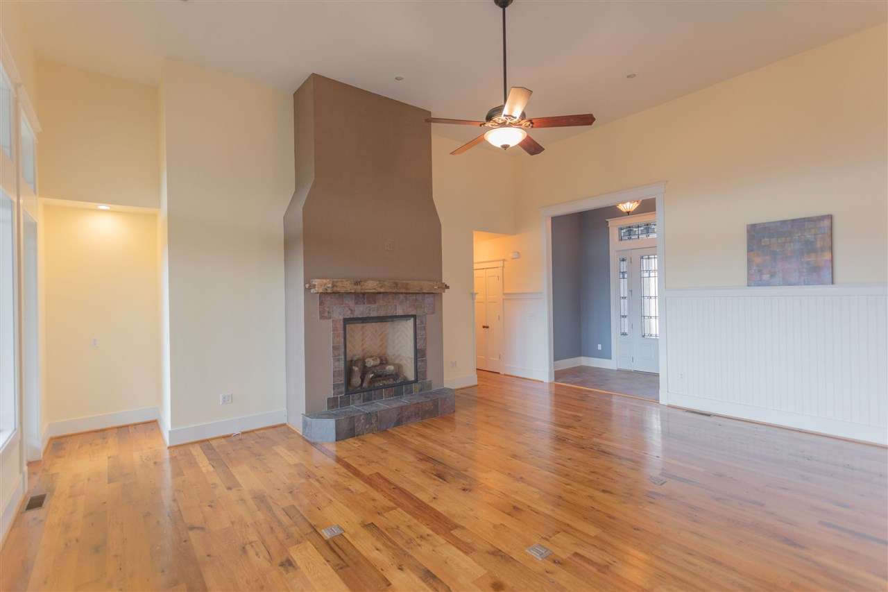 110 East Ridge Drive Lexington, VA 24450 - Photo 35 of 50 a view of empty room with wooden floor and fireplace