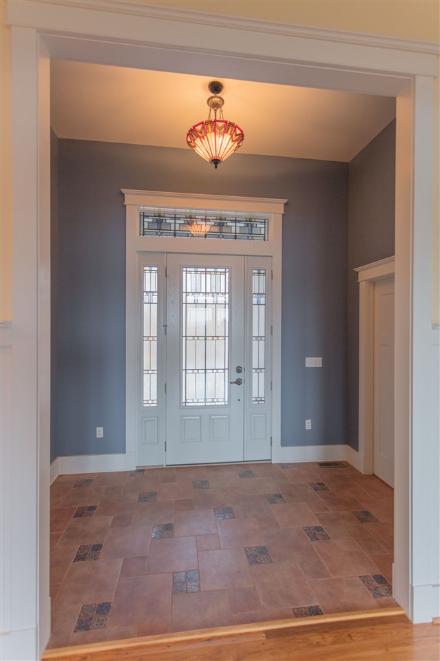 110 East Ridge Drive Lexington, VA 24450 - Photo 37 of 50 a view of an empty room with wooden floor and a window